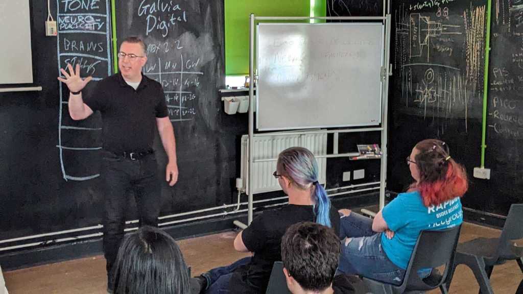 Martin Gilchrist shares his vision for impactful community events, engaging the audience at ELI5.